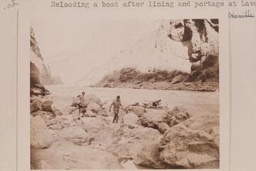 Reloading a boat after lining and portage at Lava Falls.  Left to right:  Joe Desloge; Garth Marston, Otis Marston
