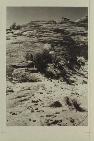 Pack string working down the bald rock into basin east of Moepitz Airfield.  The return over this trail appears in 6010 GNCN 73.18.32 and 73.18.33