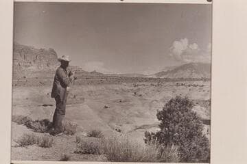 Bill Belknap stands on the edge of the plateau on the East side of the Octagon.  The canyon in front of him separates this plateau from Rainbow Mesa and the foot of Navajo Mountain
