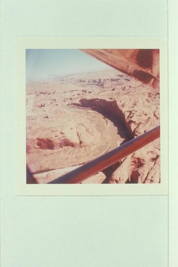 Up the Colorado River from above the mouth of Anasazi Canyon.  The Henry Mountains are upper right
