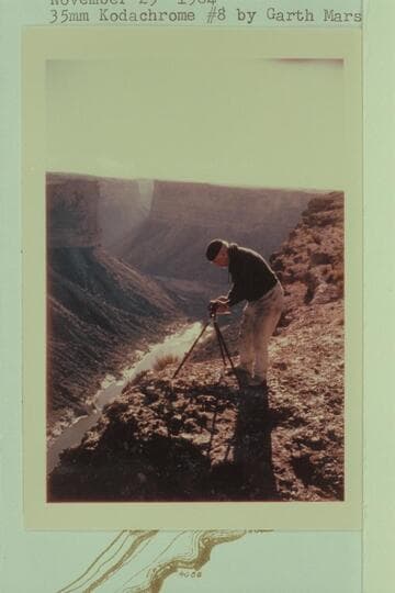 Dock Marston tries some movies at the rim above Soap Creek Rapid