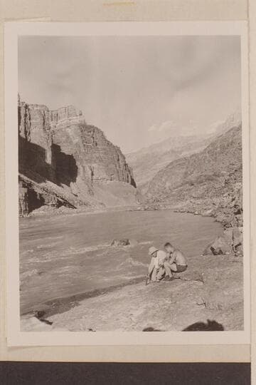 Johnny Maxson and Joseph Desloge study Archean Hotauta below Hance Rapid; @ Mile 77