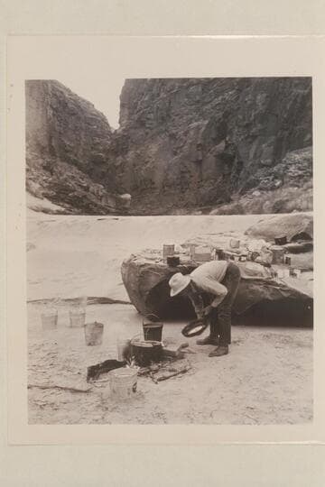 Frank Wright, Boatman and cook.  Mouth of Houserock Canyon
