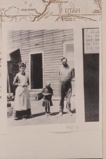 Mr. and Mrs. Arthur H. Spencer with daughter, Helen, 5 years old.  In front of Store at Mexican Hat--Goodridge