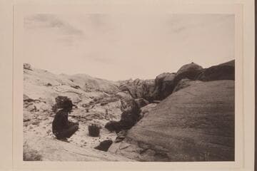 Tobe Owl watches repairs to Tom's horse.  On trail west of Nasja Creek