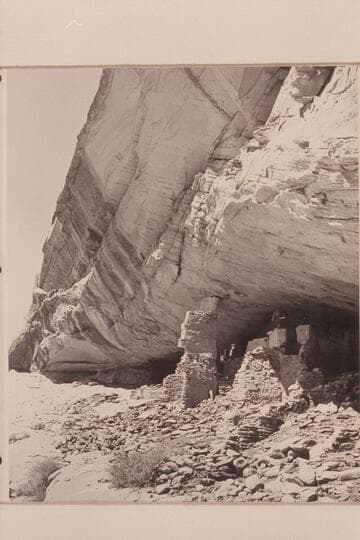 The photographers work over the ruin at Marsh Pass