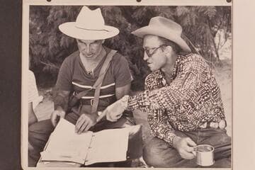 Marston (left) gets the information from Lorin Bell.  Paria Riffle