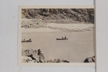 Two skiffs of the Dusty Dozen departing from Pipe Creek at 9:15 A.M