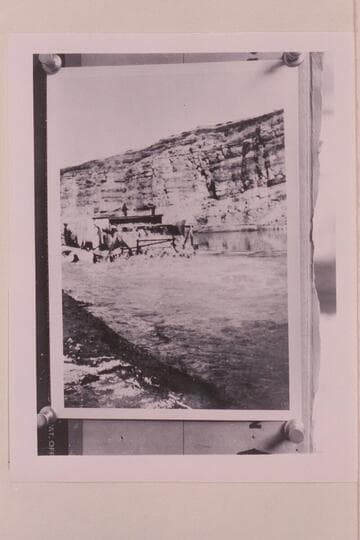 Rear view of Moab Garage Company scow showing paddle wheel in action.  The wheel was 8 ft. in diameter