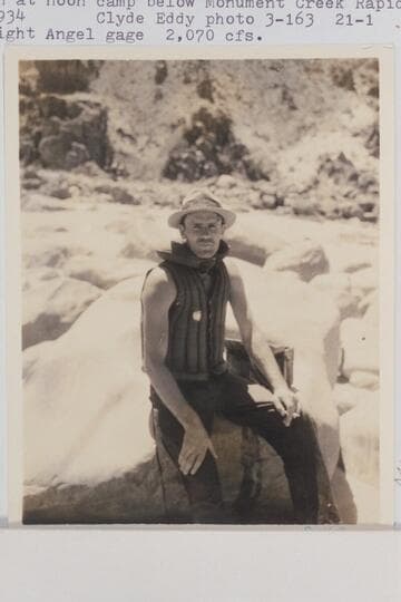 Frank Swain at noon camp below Monument Creek Rapid.  Frank filled with water and, at bottom of rapid, capsized (Eddy notes).  Bright Angel gauge:  2,070 cfs