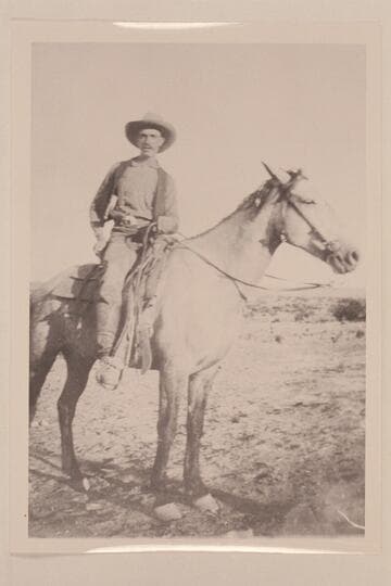 Shell Baman on a gray horse of mine when we were running wild horses in northeastern Arizona.  Shell was a hand.  Ride anything run wild horses over any kind of ground and stay with the leaders--CHS