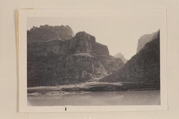 Taken during cruise from Potash to lower end of Narrow Canyon.Caption on back reads, "Fan, on left Mile 185.2."  This is side canyon just below 30 Mile Damsite which LaRue planned to use as a spillway.Refer to LaRue journal 1921, Sep. 25