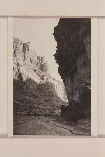 Cruise from Potash to lower end of Narrow Canyon. Caption on back: "This might be your overhang" in referring to overhang at left bank under which is the 1836 D.Julien inscription.It appears to be upper end of overhang a short distance below Cove Canyon