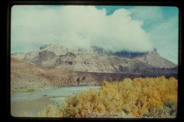 Butte near Ida's Rifle, boats of Colorado River story