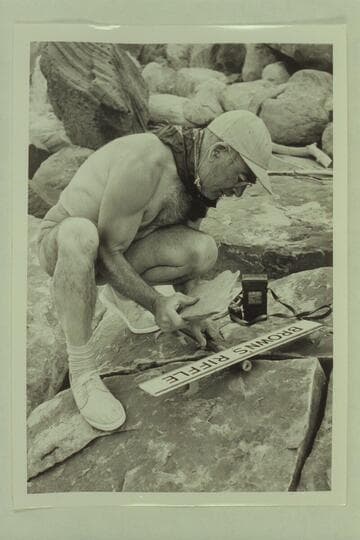 Marston preparing the sign for placement at Mile 12 marking the point where Frank Mason Brown was drowned 1889, July 10