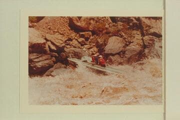 Buzz Belknap piloting the "Bootoo" through Vulcan Rapid