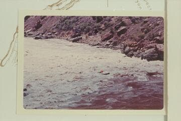 Jim Jordan driving the "Circle" as it drops over the top of the first wave in Vulcan Rapid.  Approximate gauge:  45,000 cfs.  The run could not be improved for its course
