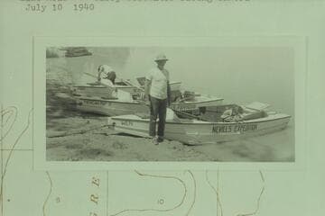 The three Nevills sadirons loading at Green River, Utah prior to departure for a transit of the river course to Lake Mead.  Barry Goldwater facing camera