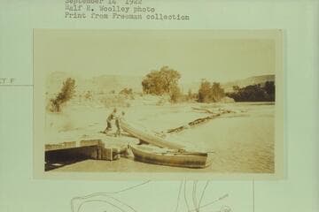 Portage of empty USGS boats over dam above Green River