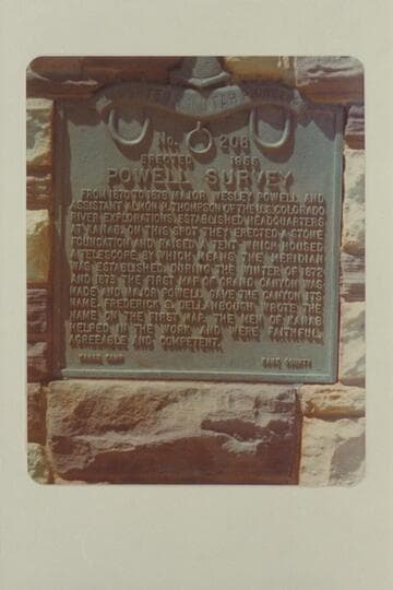 Plaque on the monument in Kanab marking the north end of Powell's baseline using information from Dellenbaugh that Powell gave the Grand Canyon its name.  Dellenbaugh was rewarded for his error by the incorrect spelling of his name