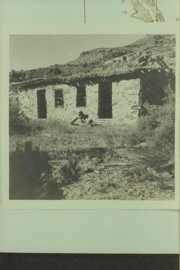 Cabin below Coal Creek; Mile 25.8 left bank