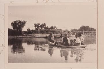Indians crossing Green River at Ouray.  The ferry is at the far shore