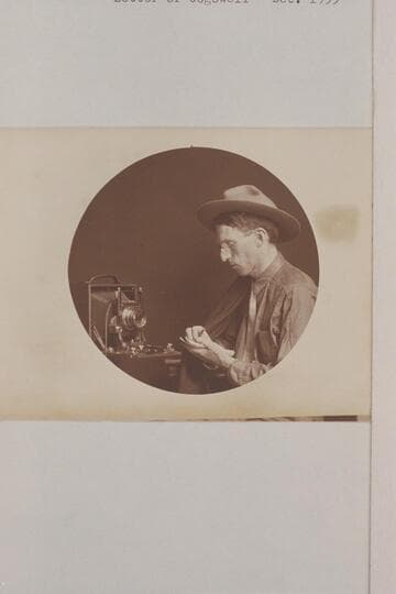 Raymond Austin Cogswell.  "Picture with the camera was in summer of 1909 just before starting on the trip.  Made in Elyria." (letter of Cogswell, 1955, Dec.)