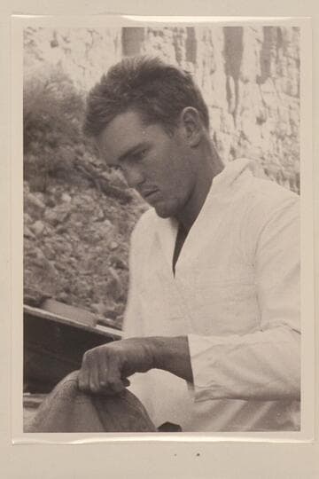 William "Gerry" Cooper.  At camp near Mile 41 in Marble Canyon.  Cooper piloted an inboard power boat through the canyons in 1951