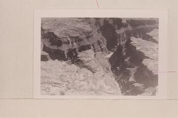 Down Stairway Canyon and across to Gateway Canyon.  Stairway Canyon enters the river at Mile 171.  The window is in a flying buttress in the right bank of Stairway Canyon