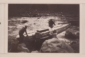 Portage at Lava Falls.  Carnegie-Caltech party.  Frank Dodge is upper right.  Maxson is left