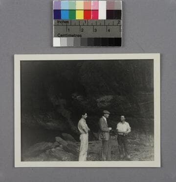 Edwin Powell Hubble and two unidentified men standing in Cave Canyon, Utah