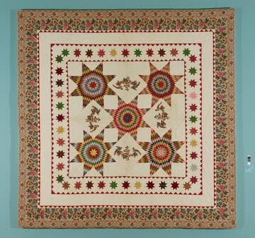 "Lone Star" Appliqued Chintz and Pieced Quilt
