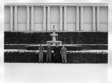 Huntington employees in front of the library building after snowfall, January 11, 1949