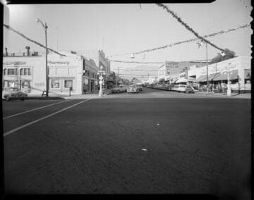 Street lighting on a corner with Christmas decorations up