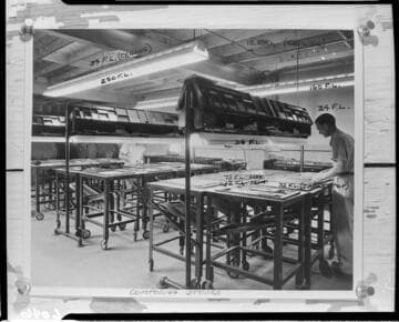 Men working in the pressroom of the Ledger Gazette