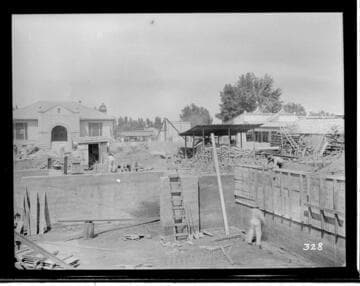 A construction crew working on the construction of the Visalia Local Office Building