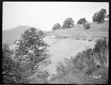 A construction crew working on the forebay reservoir of the Tule Plant