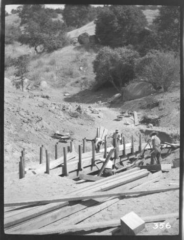 A construction crew working on the flume at the Tule Plant