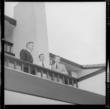 Award presentation to developer of all-electric condos on hillside