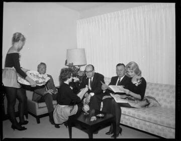 Catered gathering of people at electric home promo