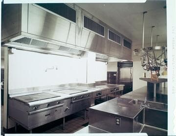 Commercial kitchen with stainless steel equipment