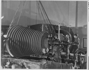 A construction crew working on a power plant