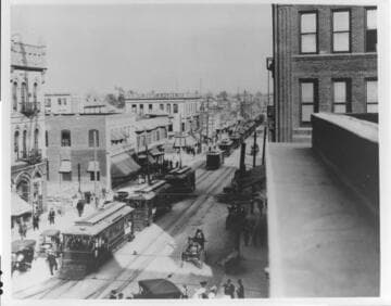 Rush hour, 1910-style, shows Los Angeles Railway and Pacific Electric trolleys lined up for three blocks on Seventh Street