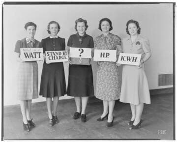 P1.1 - Group Portraits -- Five women holding signs