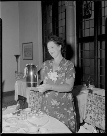 Woman unwrapping gift