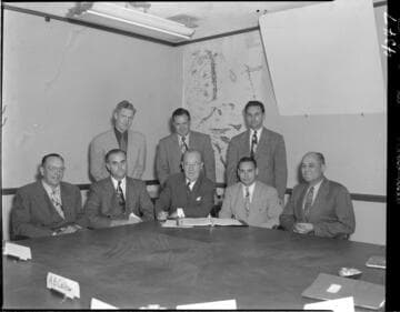 Edison executives at the board room table