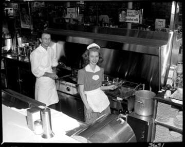 Fry cooks in a commercial kitchen