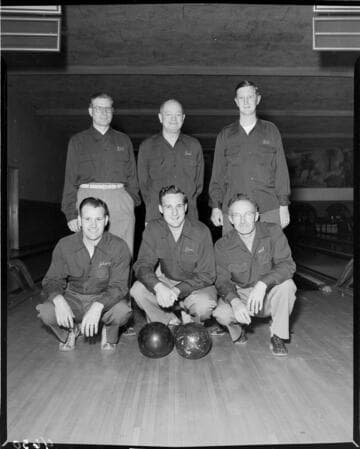 Six man bowling team at bowling alley