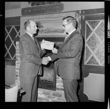 Men receiving Certificates of Completion from SCE's Distribution Technicians School