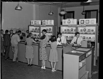 Customers exchanging old clocks for new ones during the frequency change at special depots like this one in Santa Barbara